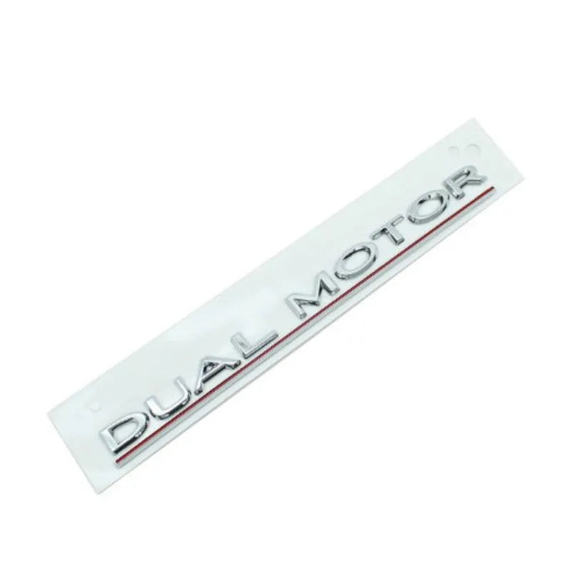 Black and red ABS plastic Double Motor performance badge sticker for Tesla Model 3 bumper.