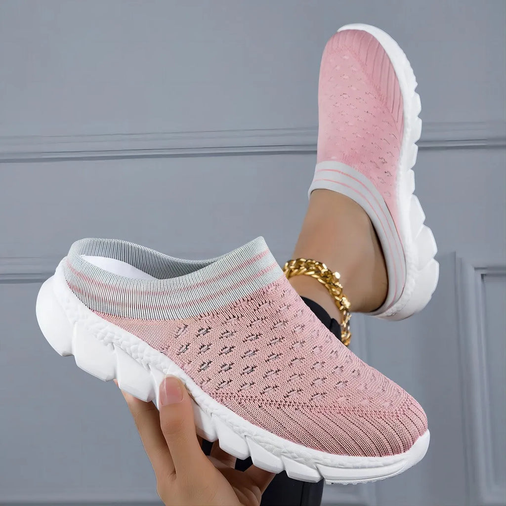 Women's black striped Flyknit slipper shoes with a height-increasing sole on a plain background