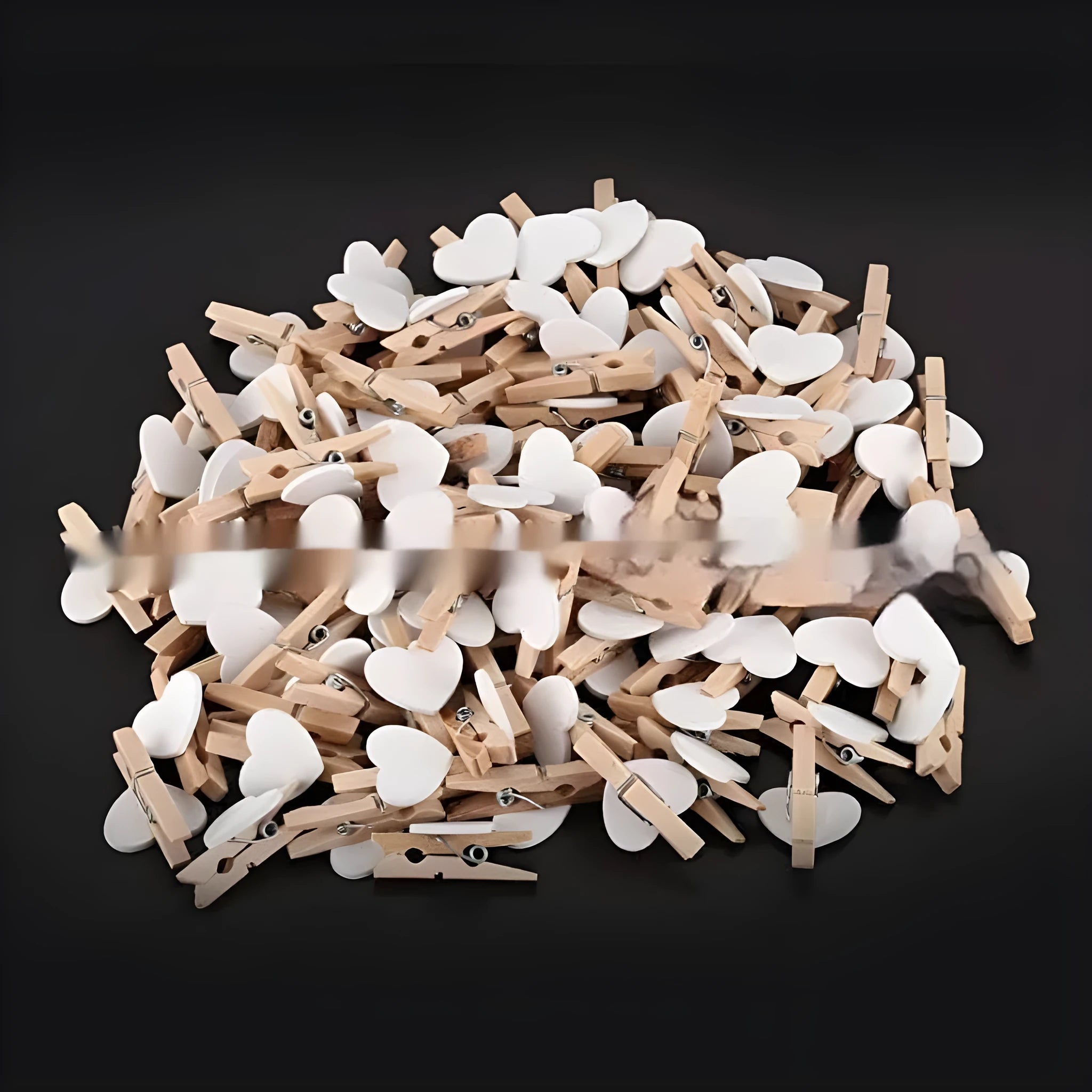 Set of five wooden heart-shaped clips in red, white, pink, yellow, and rose red colours.