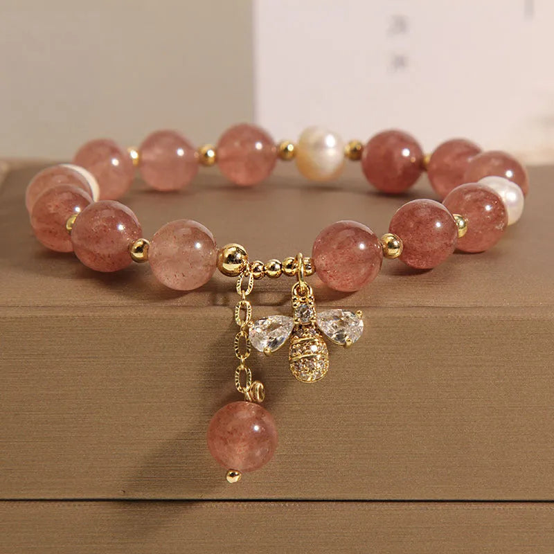 Women's pink strawberry quartz and freshwater pearl bracelet with zircon and alloy accents.