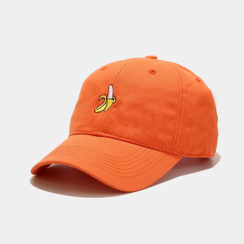 Adjustable baseball cap with cute banana embroidery in seven colour options on soft polyester fabric