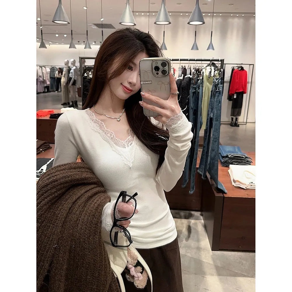White V-neck long sleeve top with lace stitching and brushed finish, slim fit, sizes S-XL.