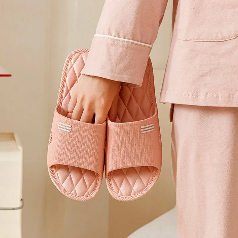 Anti-slip lozenge texture PVC home slippers in solid colours for indoor summer wear