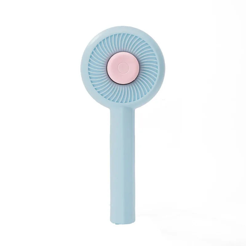 Blue and yellow pet grooming brush with angled bristles and self-cleaning button