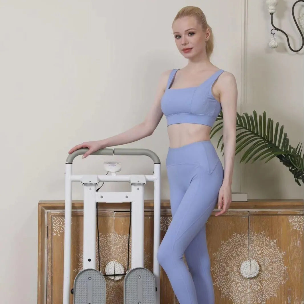 White foldable home treadmill with climbing frame functionality in folded position