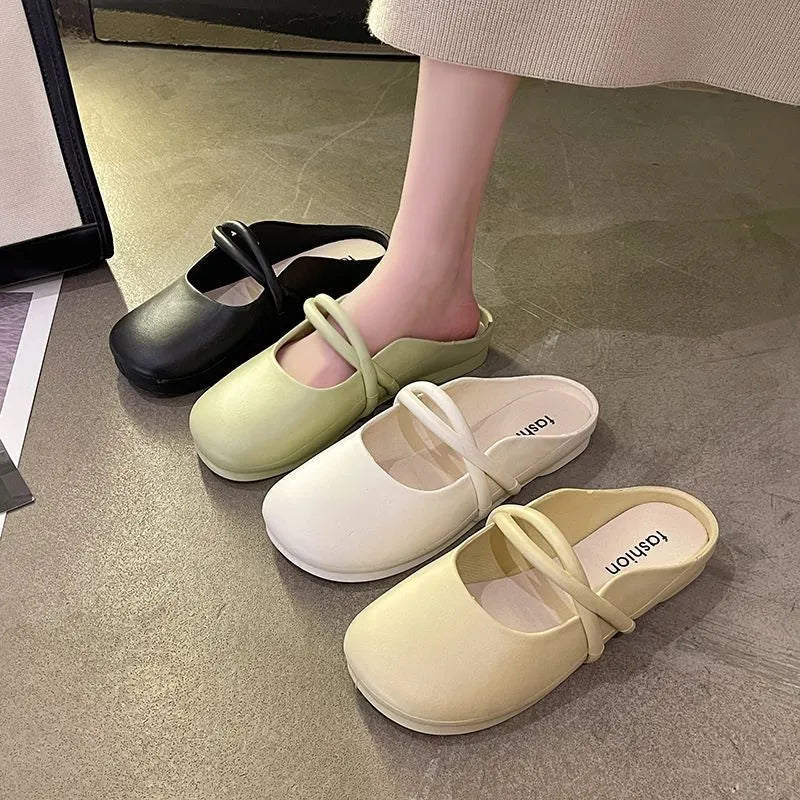 Women's baotou flip flop sandals in black, beige, or green with a plastic upper.