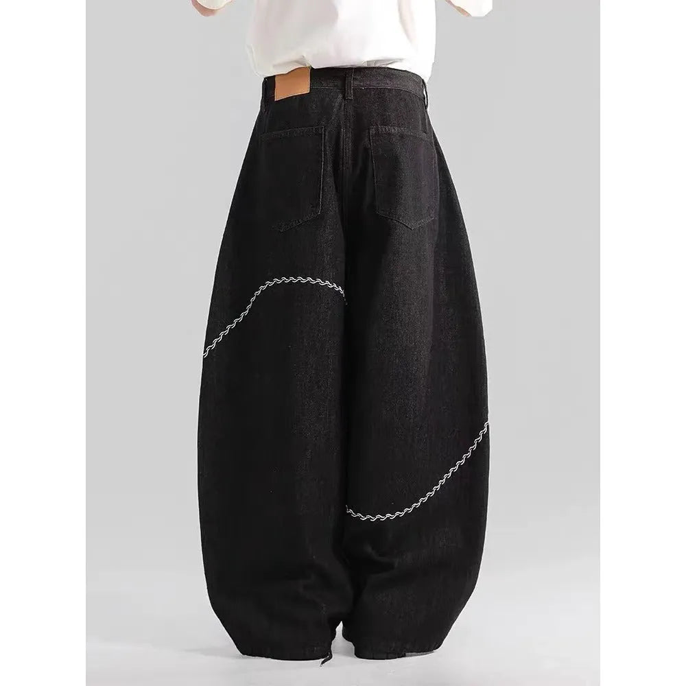 Black straight-leg denim trousers with mid-waist zip placket for autumn winter streetwear