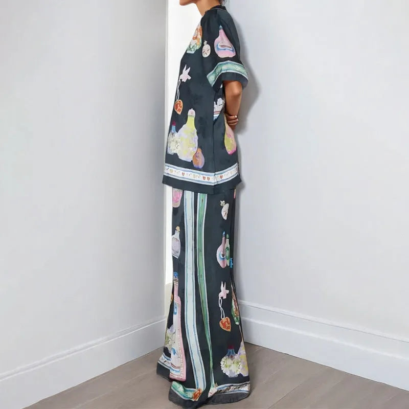 Black women's cardigan and trouser set with cartoon animation pattern