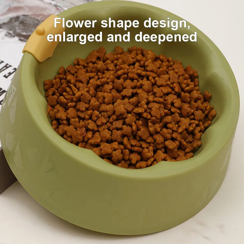 Green plastic double pet bowl for dog and cat food and water on a white background
