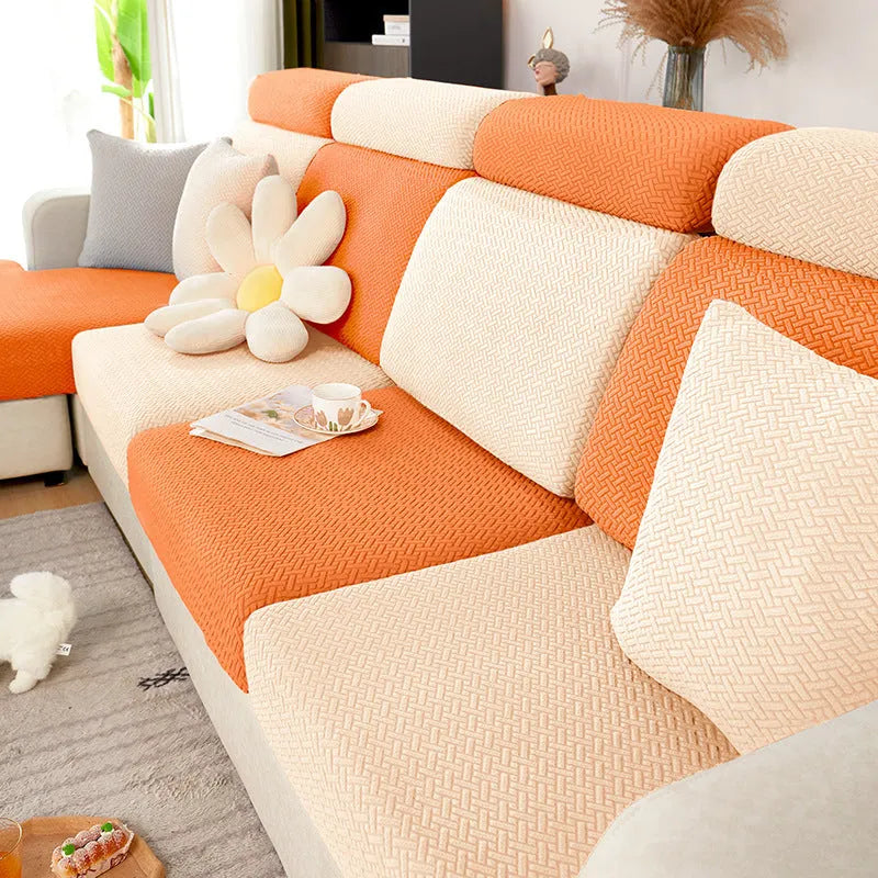 Home Fashion stretch sofa cover in fruit green colour on a modern couch