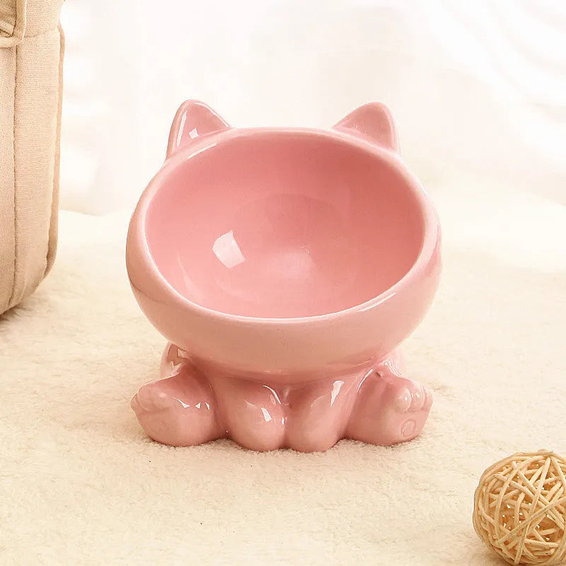 Ceramic cat bowl with oblique mouth and neck guard in black and white colour option