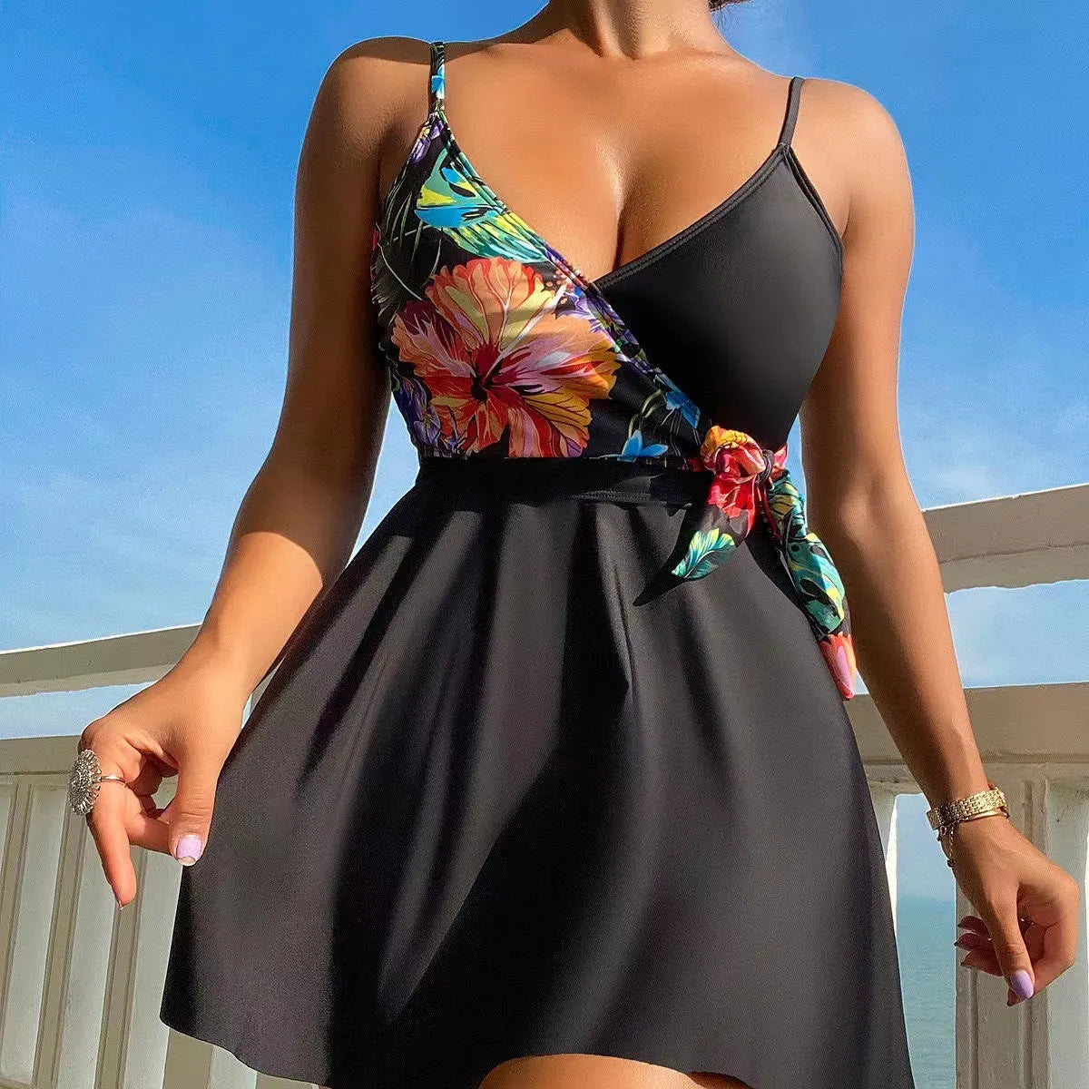 Black women's high waist briefs with printed split bikini style for swimming and sports.
