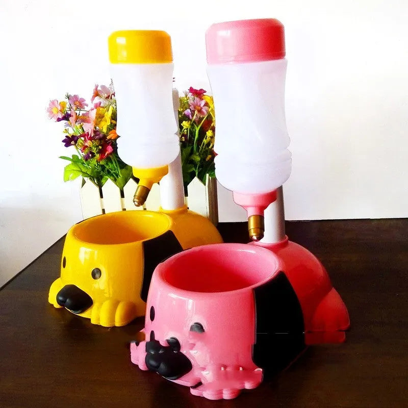 Pink adjustable rod lifting pet drinking bowl on a stand
