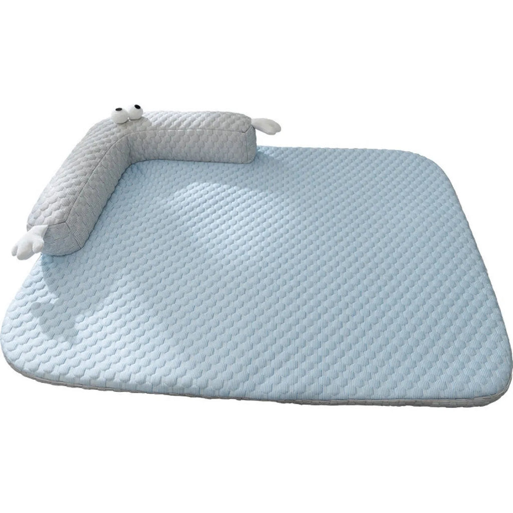 Blue big-eyed monster design non-slip pet cushion for dogs and cats on a wooden floor.