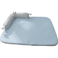 Blue big-eyed monster design non-slip pet cushion for dogs and cats on a wooden floor.