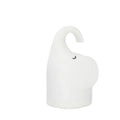 DOMI Elephant-shaped silicone USB night light with warm white glow on a bedside table.
