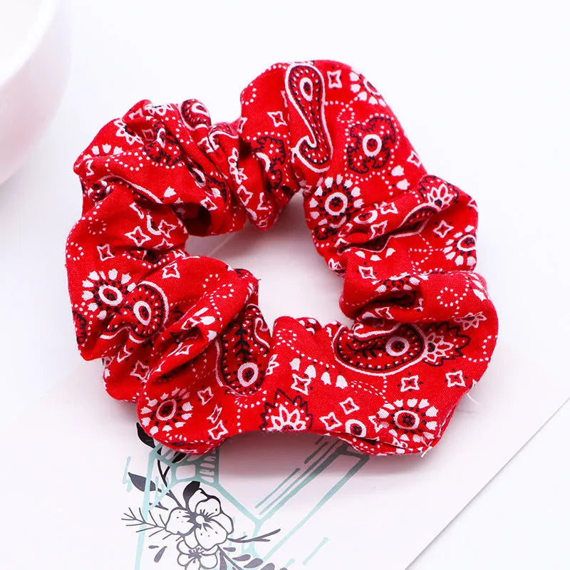 Cashew flower ponytail hair tie in black - large intestine cloth hair accessory for women