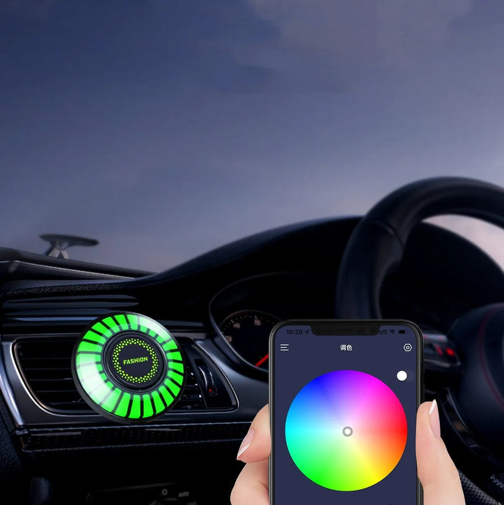 Car air outlet aromatherapy light with RGB illumination attached to vehicle vent
