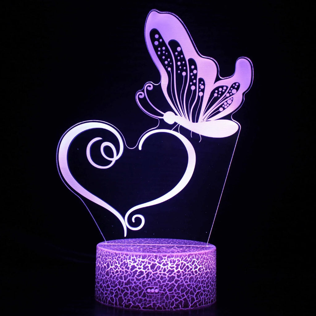 Colourful acrylic 3D USB table lamp with touch control on a small black ABS base.