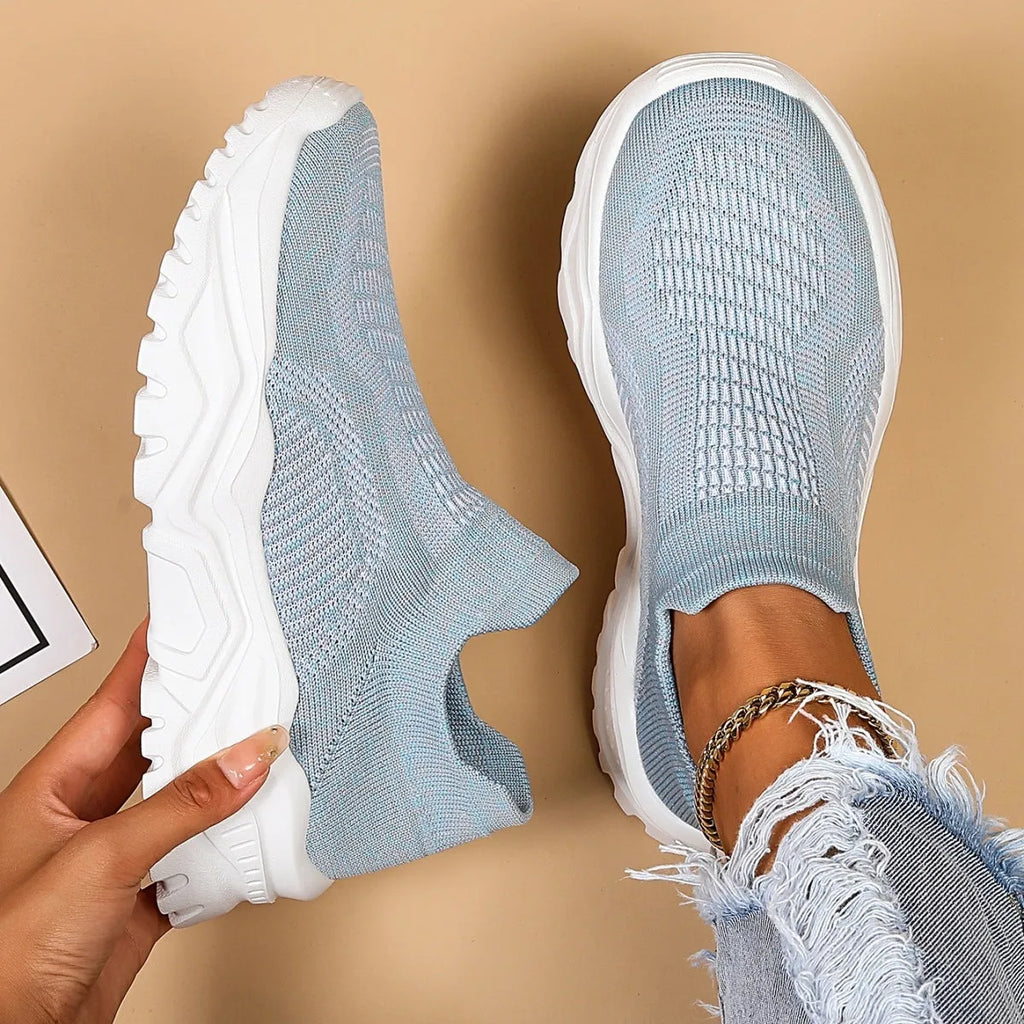 Light blue women's mesh slip-on sports shoes with round toe and mid heel