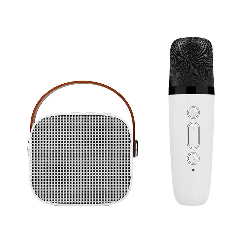 Compact white, pink, or blue plastic portable Bluetooth speaker with microphone on a surface.