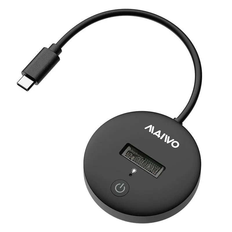Black external NVME to USB-C SSD enclosure with 10Gbps speed on a desk.