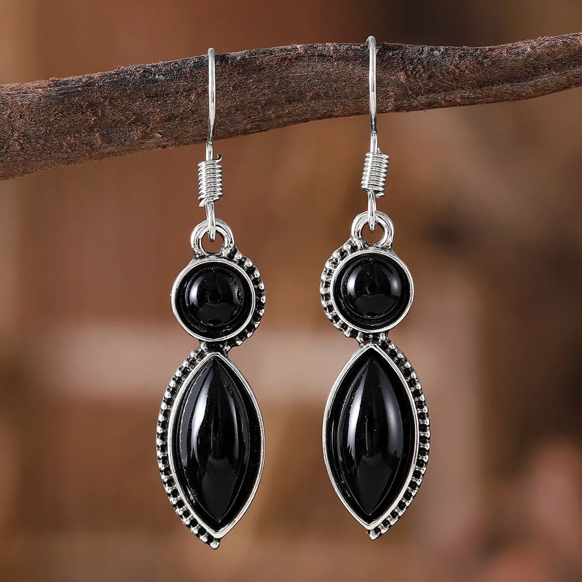 Geometric zinc alloy drop earrings with electroplated black and purple finish, retro bohemian style.