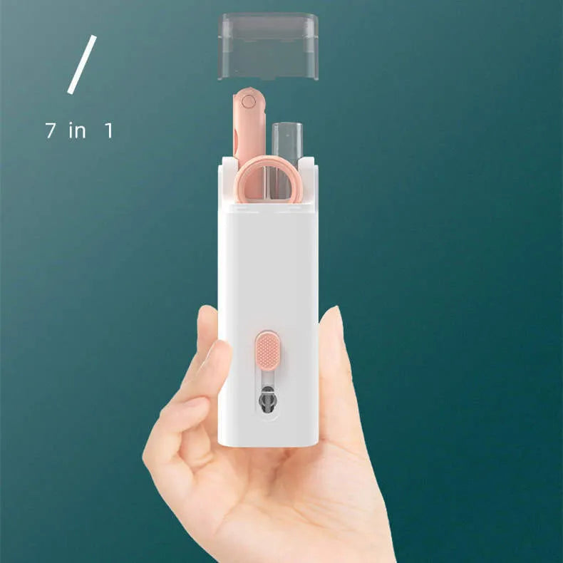 Multifunctional cleaning kit with a double-headed pen, retractable brush, and spray bottle on a white background
