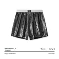 Men's bright silver woven underwear with reflective galaxy pattern showing loose fit mid-waist design