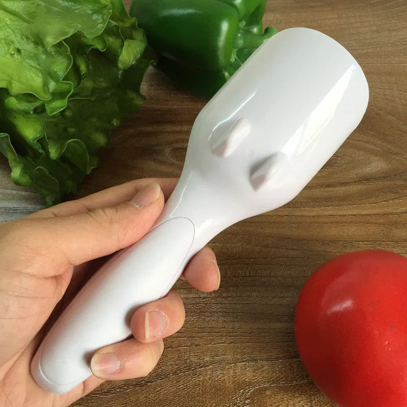 Photo-colour cake batter scoop with push lever on handle, 19.5 cm long, on white background