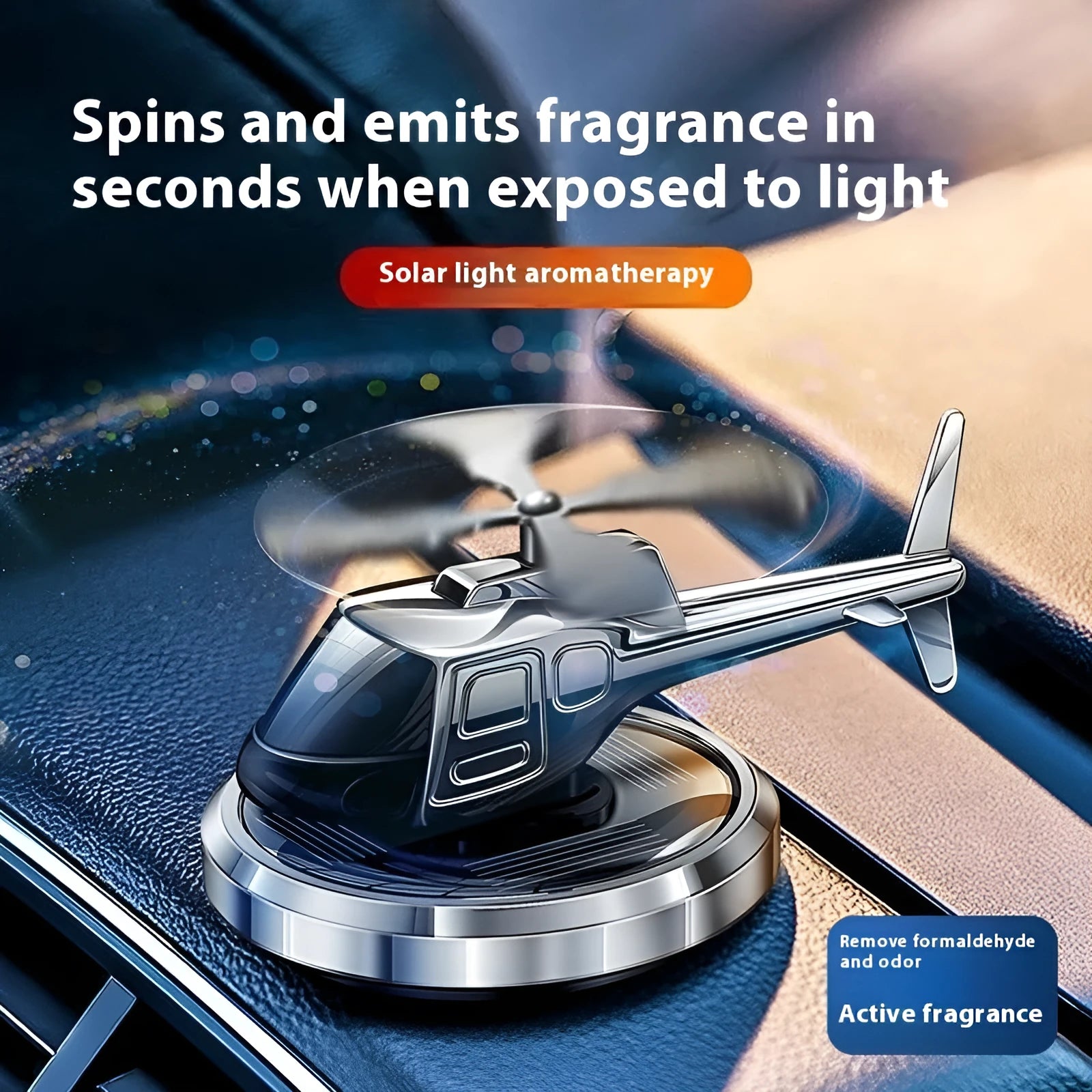 Silver metal solar-powered helicopter car ornament with rotating blades on a car dashboard.