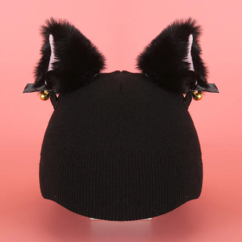 Plush fabric cartoon character helmet cover for a medium-sized dog or cat on a white background.