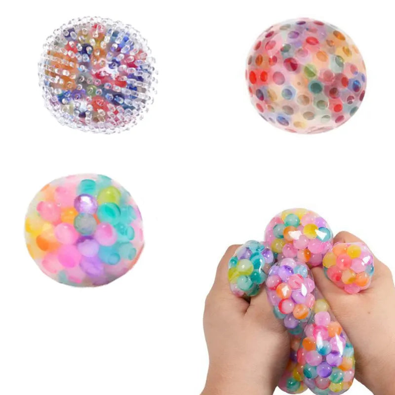 Rainbow TPR soft rubber stress ball 6cm diameter on white background OPP bag