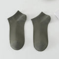 Men's solid colour low-cut boat socks in polyester, shown in multiple colour options.
