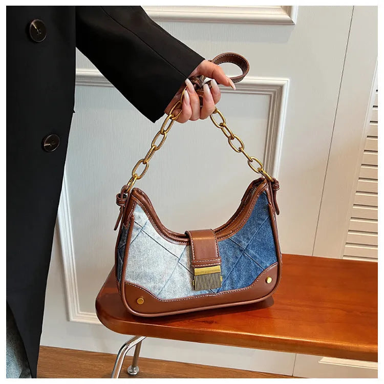 Brown denim women's bucket shoulder bag with chain straps and diamond mesh detailing