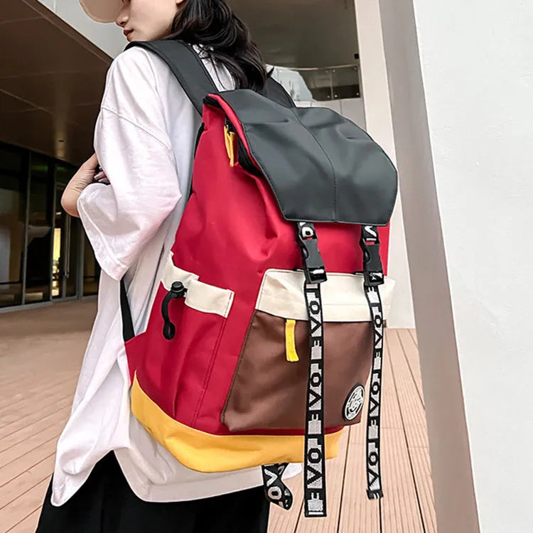 Oxford cloth backpack in black, green, or red with shoulder straps and handle