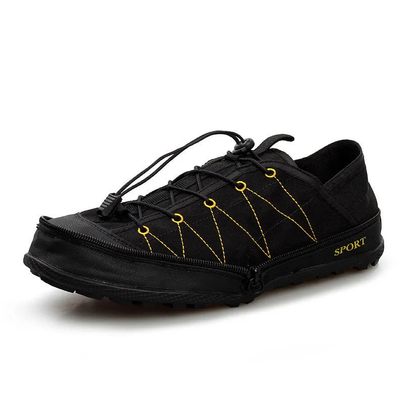 Orange portable folding outdoor shoe with mesh upper and side zipper, shown partially folded.