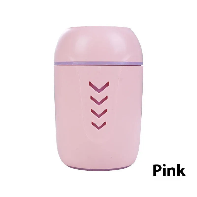 Small round portable air purifier in blue colour with USB cable for car or desktop use.