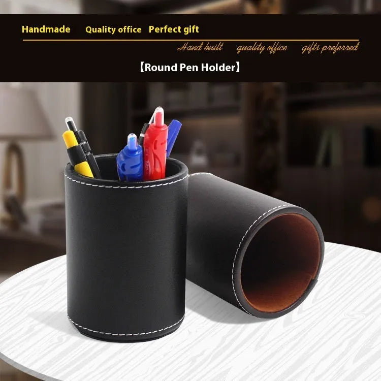 Black leather round pen container with 8.0cm diameter measurement
