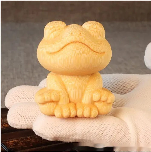 Solid bamboo carving ornament with smiling frog design measuring 5cm height