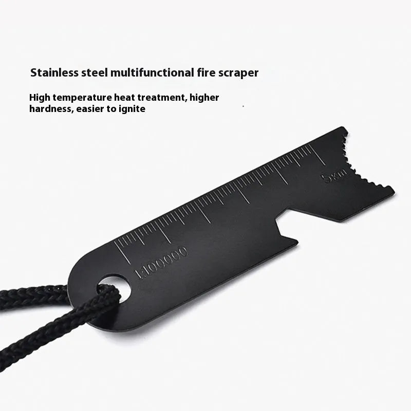 Black multifunctional camping flint with magnesium rod and stainless steel scraper showing graduated scale and bottle opener