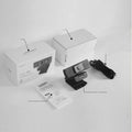 Black USB webcam with magnetic privacy cover on a desk, showing 1.7m cable.