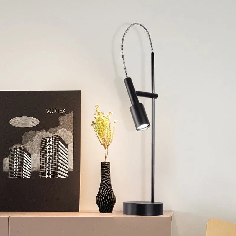 Rotating wrought iron bedside table lamp with G9 5W light source, available in sand black, sand nickel, or natural copper.