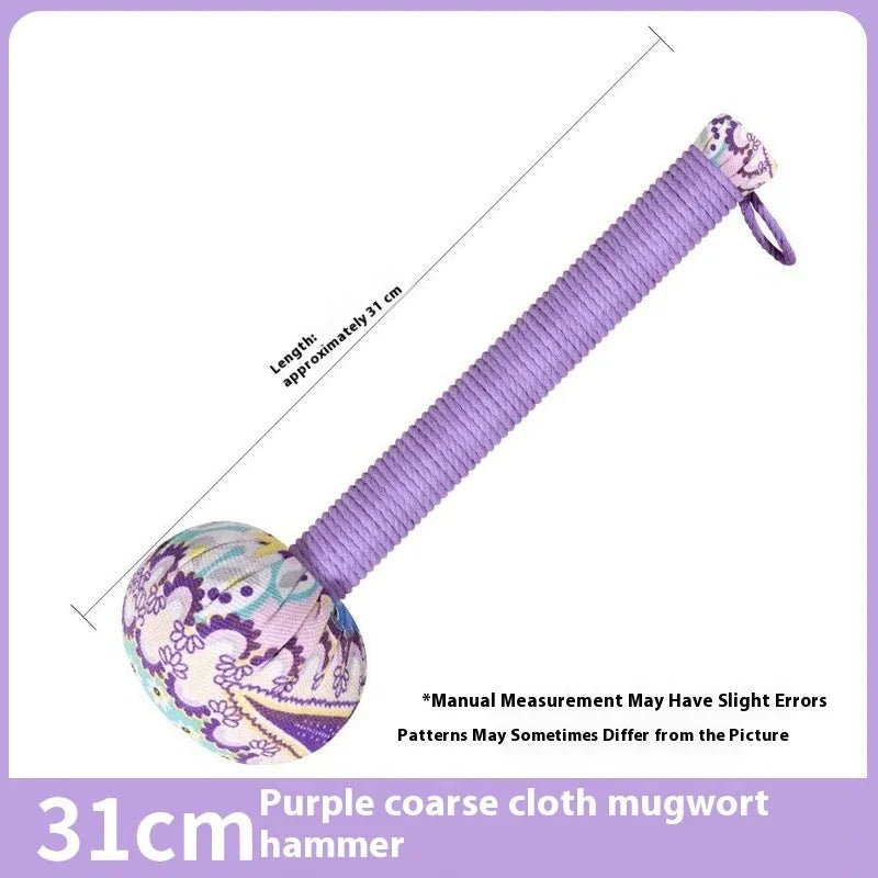 Argy wormwood massage hammer in green colour showing hand-held design for neck and shoulder massage
