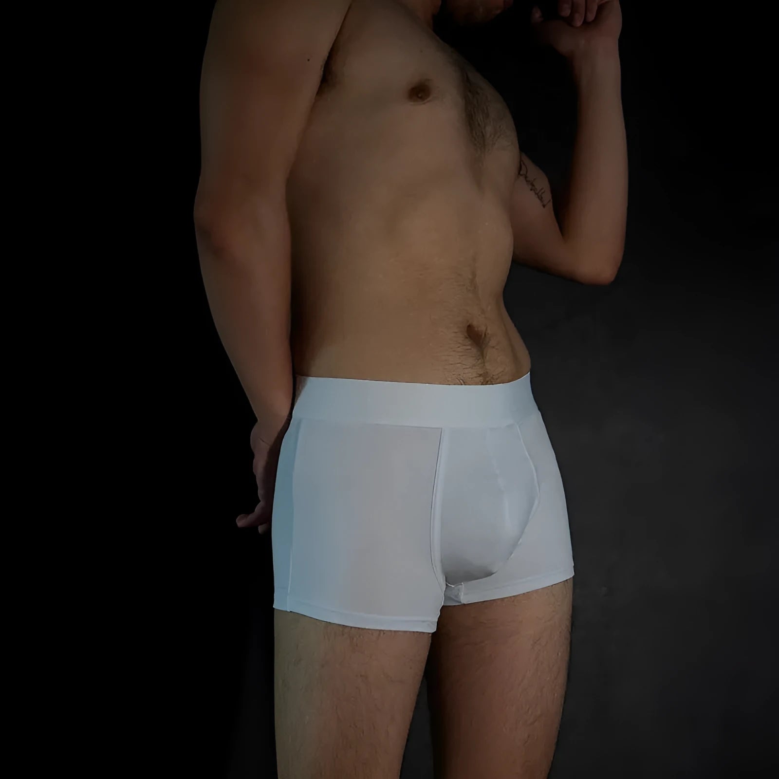 Men's solid colour cotton boxer shorts in black, white, silver grey, and light green.