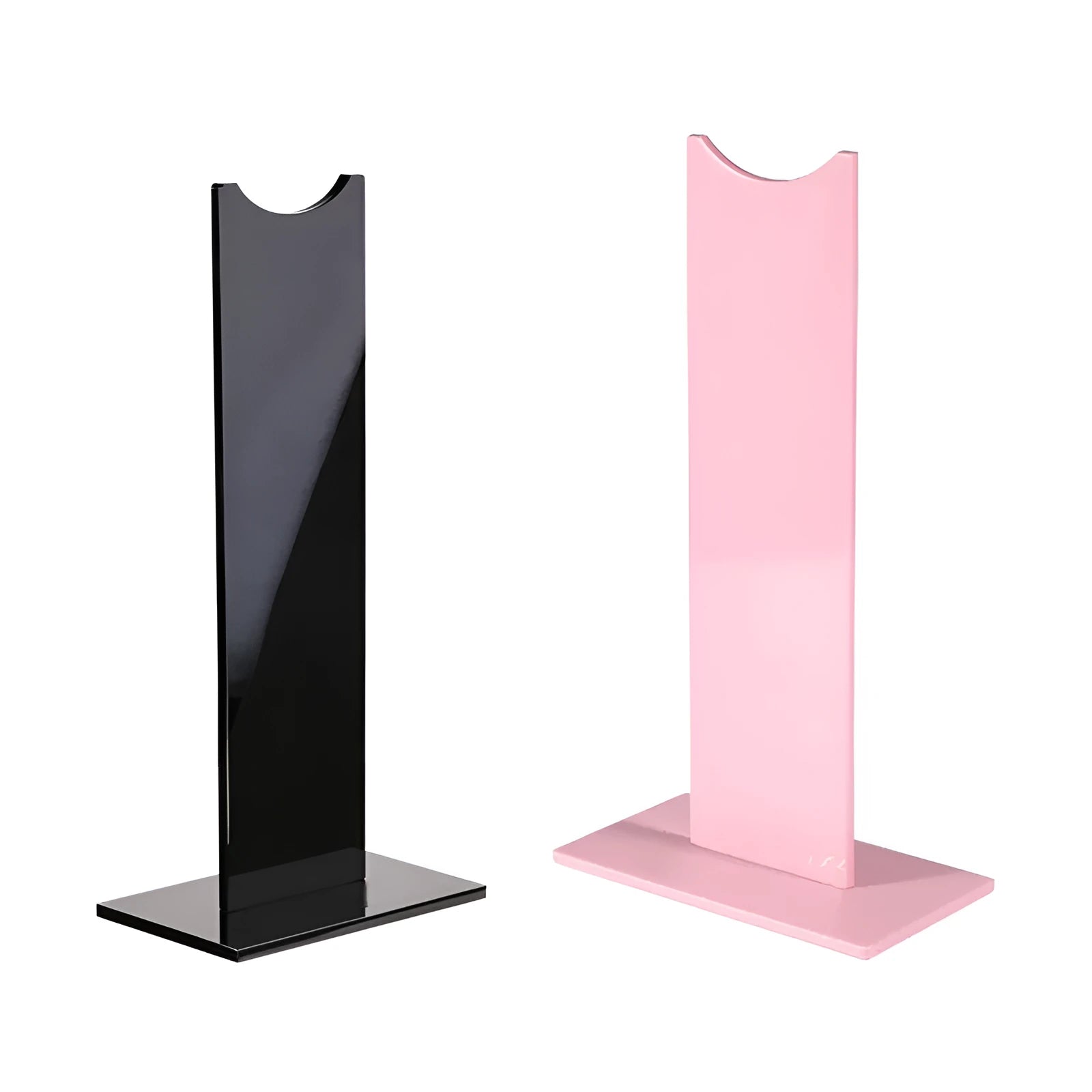 Pink and black detachable headphone stand for gaming headsets on a desk