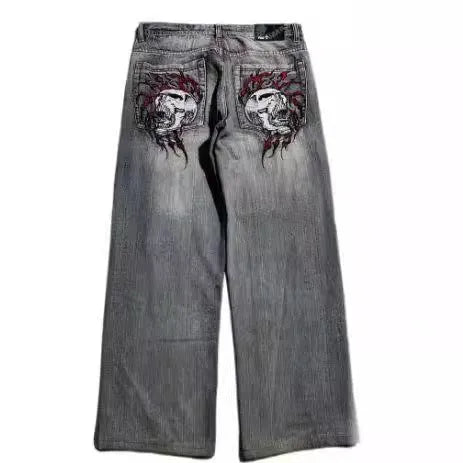 Grey washed-out wide-leg men's jeans with a straight cut and mid-waist design on a neutral background.