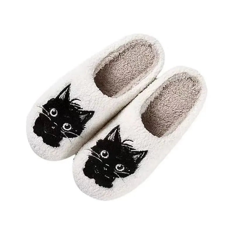 White plush slippers with Black Beard Cat cartoon couple design, showing thick construction and textured TPR sole.