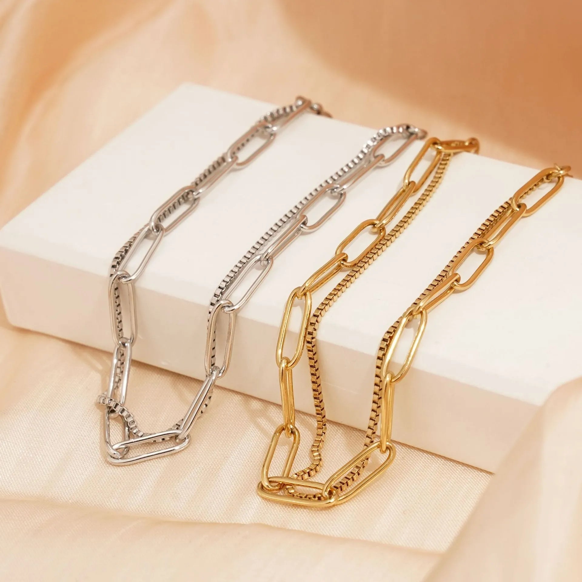 Women's double layer titanium steel bracelet with geometric design in gold or silver electroplated finish