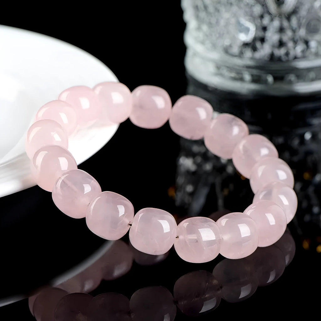 Pink crystal barrel bead bracelet with 11-12mm geometric beads and unisex design